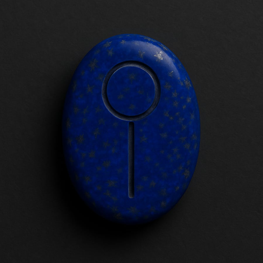 Engraved lapis stone with the Menheta symbol, a vertical line rising into a circle, from the Odes of Light collection of House of Veyrion.